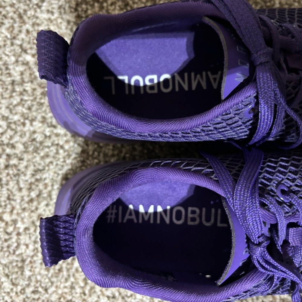Purple iridescent runners. Excellent condition. Worn less than 5 times.